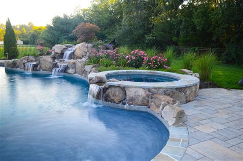 Spa Waterfalls | Aquatic Artists | Pool Waterfalls | NJ, PA, NY, DE, MD | Spa waterfall, Pool ...