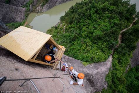 Shiniuzhai National Geological Park opens a cliffside shop at 330ft for rock climbers to buy ...