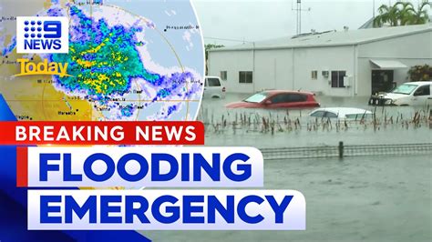 Cairns floods update: Nine people trapped on hospital roof as flood ...