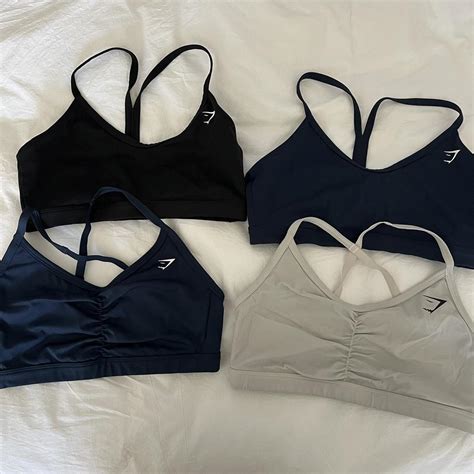 GYMSHARK sports bras 2x v neck, black & navy size... - Depop