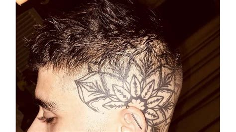 Zayn Malik shows off giant floral head tattoo - 8days
