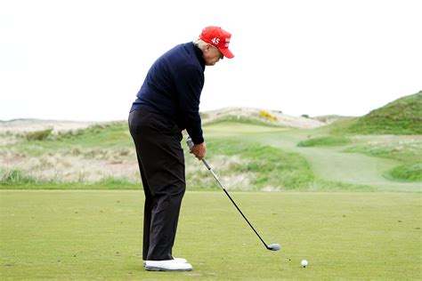 Donald Trump plays golf at his Turnberry course during Scottish visit