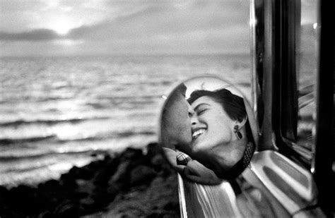 Elliot Erwitt is a documentary photographer known for his candid shots.