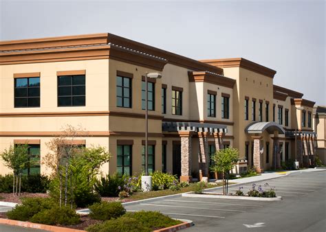 Wide angle view of modern office park building | The Real McCoy ...