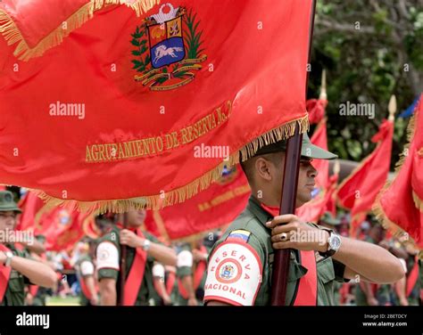 A Venezuelan reserve troop soldier march during a military parade in ...