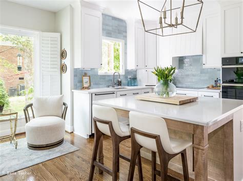 This Coastal Kitchen By Caren Rideau Features A Juice Bar And Glass Front Cabinets | lupon.gov.ph