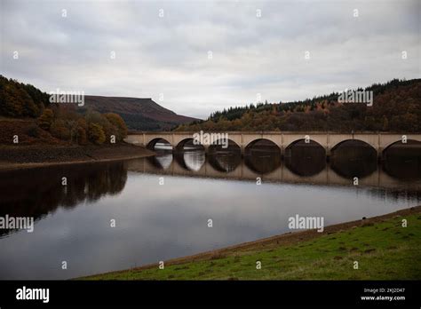 Bridge pictured at Ladybower Reservoir with Bamford Edge in the background, Derbyshire, UK Stock ...