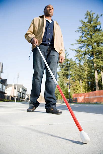 Blind Person Walking Stock Photos, Pictures & Royalty-Free Images - iStock