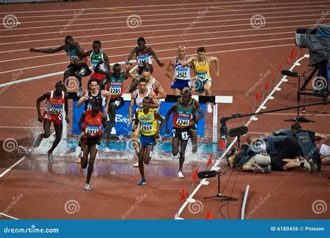 Olympic athletes running editorial photo. Image of chase - 6180456