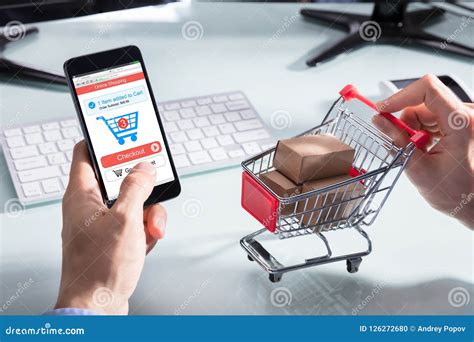 Person Shopping Online on Mobile Phone Stock Photo - Image of metal, hand: 126272680