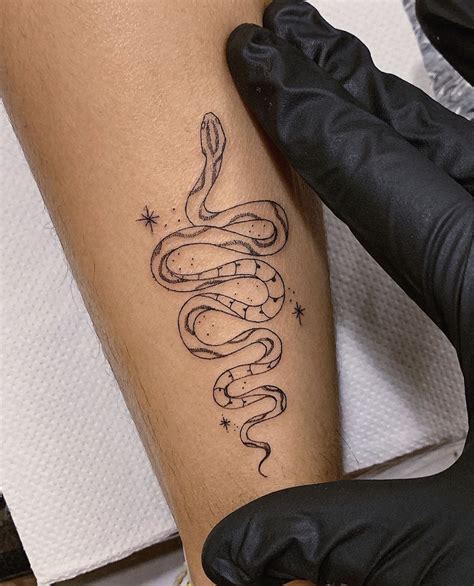 Snake tattoo | Snake tattoo design, Tattoos for women, Picture tattoos