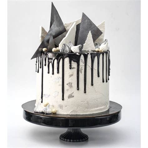 Black, white and silver dripping chocolate cake. Eyal Revah (@eyalrevah ...