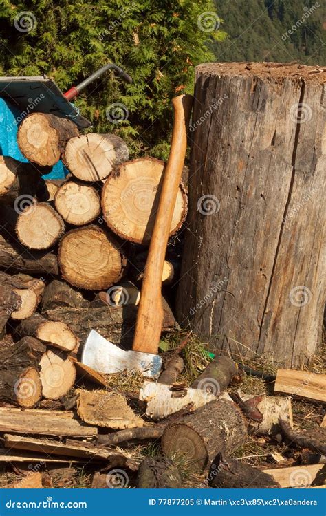 Old Ax on Log and Firewood. Axe Cut into Wood after Chopping Firewood. Stock Image - Image of ...