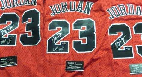 Coach's Corner - 3-Michael Jordan hand signed/certified Bulls jerseys.