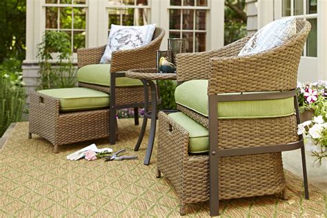 This patio conversation set is perfect for small spaces. Push the ottomans underneath the seats ...