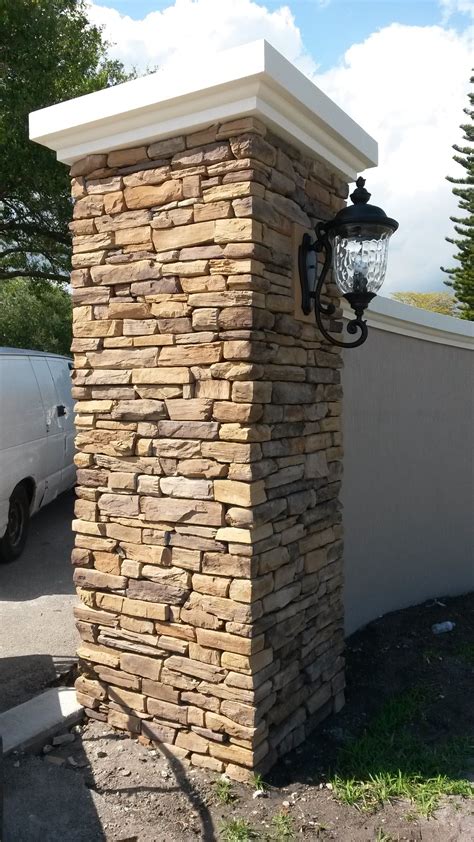 Pin on stacked stone pillor