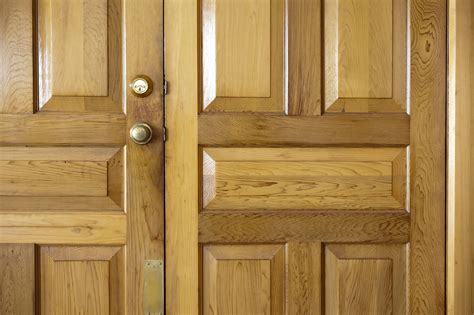 Free Image of Natural wood double front doors to a home | Freebie.Photography