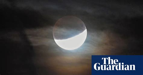 Partial lunar eclipse – in pictures | Science | The Guardian