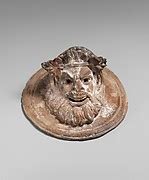 Two terracotta roundels with theatrical masks | Greek | Hellenistic | The Met