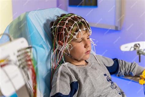 Premium Photo | Eeg electrode placement to patient during eeg record. electroencephalogram eeg