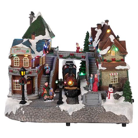 Christmas village with animated train station lights music 25x35x25 ...