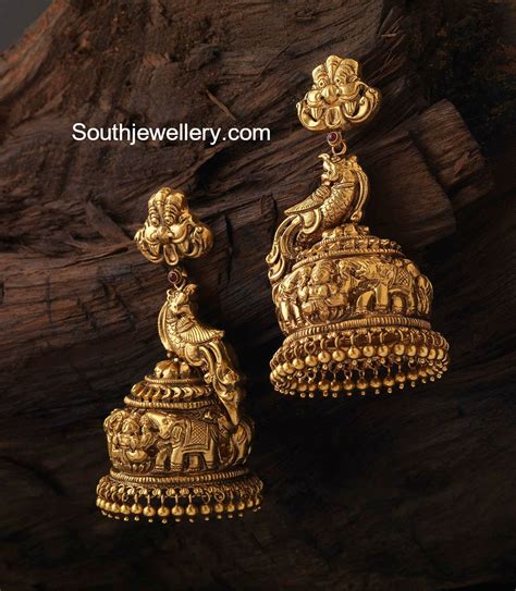 Antique Gold Peacock Nakshi Jhumkas - Jewellery Designs