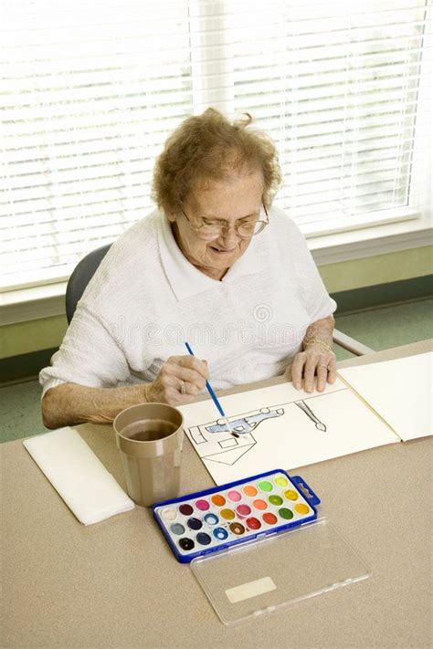 Elderly woman painting. Elderly Caucasian woman painting with watercolors at ret , #Ad, # ...