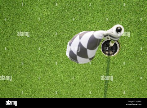 golf hole flag on a field Stock Photo - Alamy