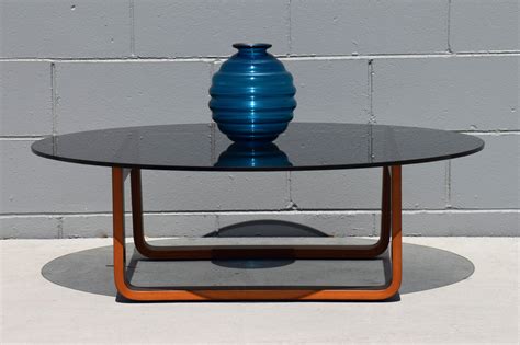 Mid-Century Round Smoked Glass Coffee Table - Structured Rebellion