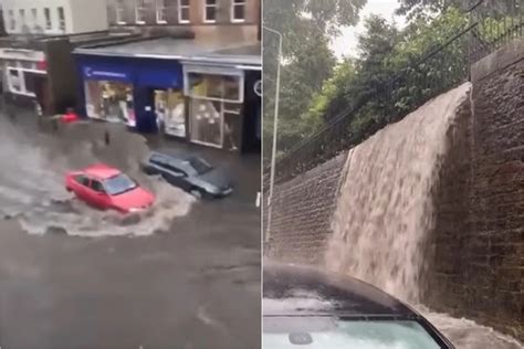 Edinburgh flash floods spark WATERFALL as cars battle through submerged streets