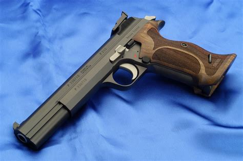 Weapons: Sig P210-5LS chambered in 9mm