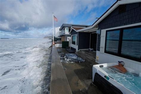 Massive waves on California coast cause flooding, force evacuations ...