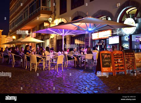 Nightlife, patrons in the restaurant, Puerto de la Cruz, Tenerife ...