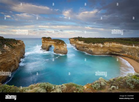 window arch at Loch Ard Gorge at dawn, Port Campbell National Park ...