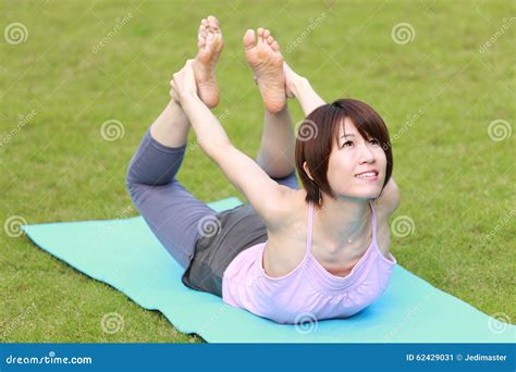 Japanese Woman Doing YOGA Bow Pose Stock Image - Image of health, outdoor: 62429031