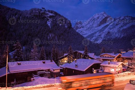 mountain village in alps at night 10767060 Stock Photo at Vecteezy