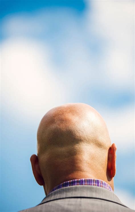 Download Bald Man And Blue Sky Wallpaper | Wallpapers.com