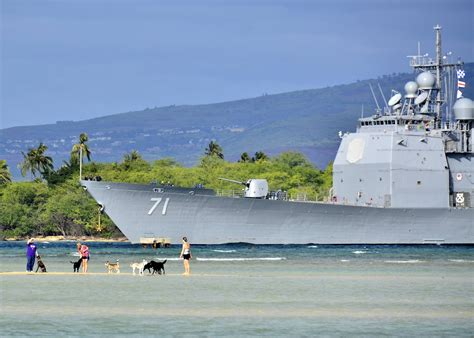 USS Cape St. George (CG-71) enjoying some time on the beach with the ...