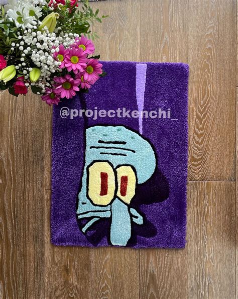 My brother made this rug of Squidward from his talent show : r/spongebob