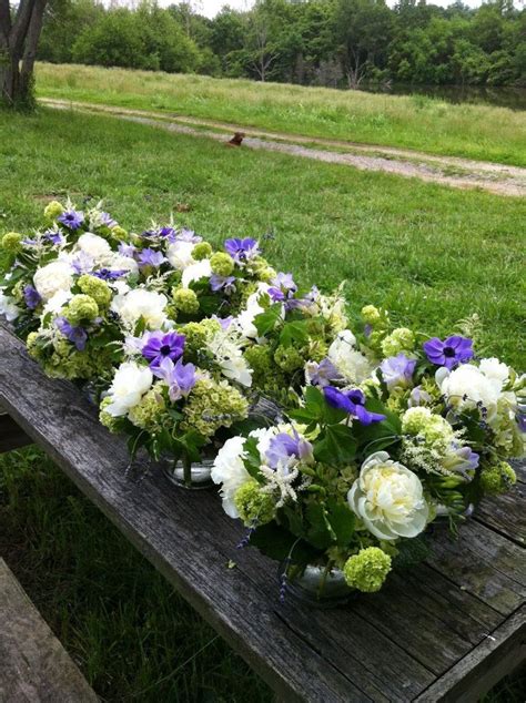 These flowers in purple, white, and green from Nanz & Kraft Florist would make gorgeous ...