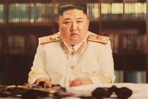 Kim Jong-un shows off new white military uniform for first time as he ...