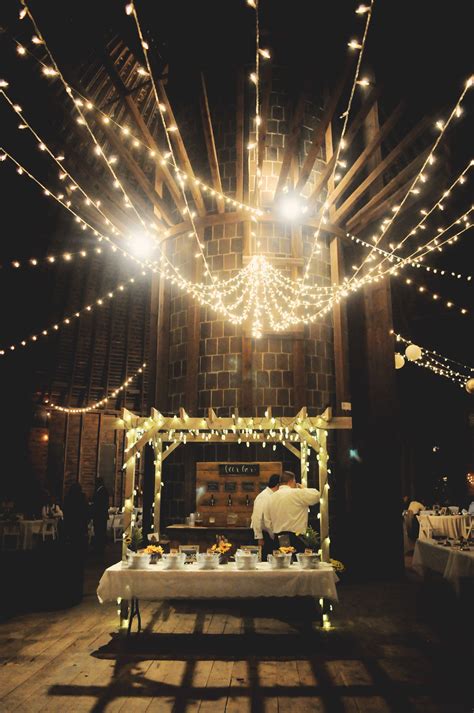 Gorgeous Rustic Bar with String Lights at the Historic Round Barn