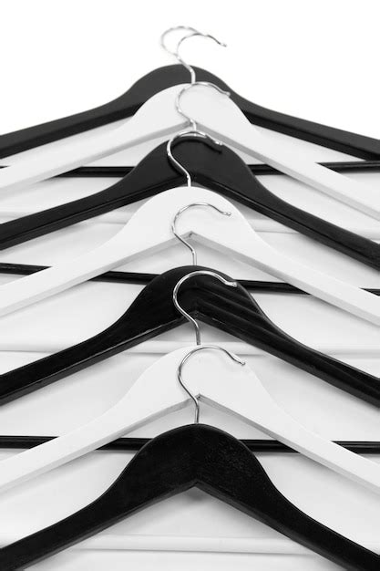 Premium Photo | Black and white clothes hangers isolated on white