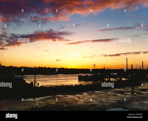 Harbour at sunset Stock Photo - Alamy