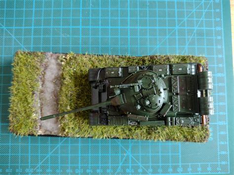 Finished my second diorama and first tank. Revells 1/72 T-55 A/AM in East German markings, muddy ...