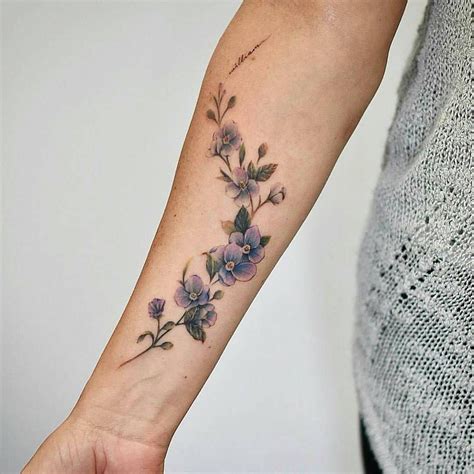 100+ Tattoo & Flower tattoo | Flower wrist tattoos, Cool small tattoos, Vine tattoos