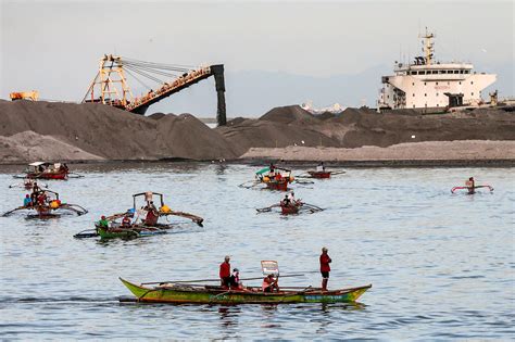 Philippine fishermen balk at land reclamation projects | Flipboard