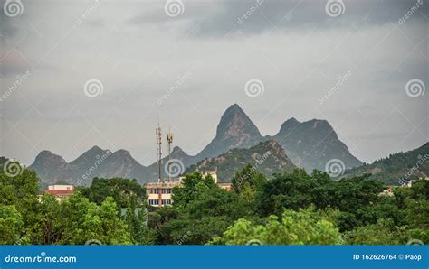 Buildings of Guilin with Karst Mountains in the Background Stock Photo - Image of hills, hill ...