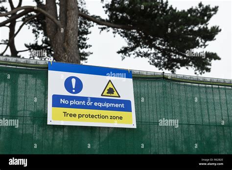 Signage for a Tree Protection Zone on a UK construction site Stock Photo - Alamy