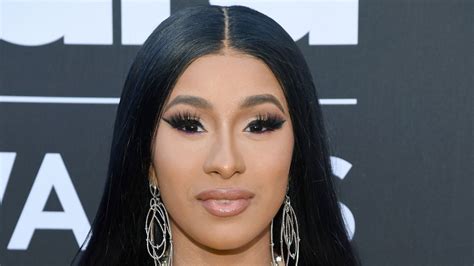 Cardi B Got Dermal Piercings and a Tattoo Touch-Up At Home — See Photos | Allure